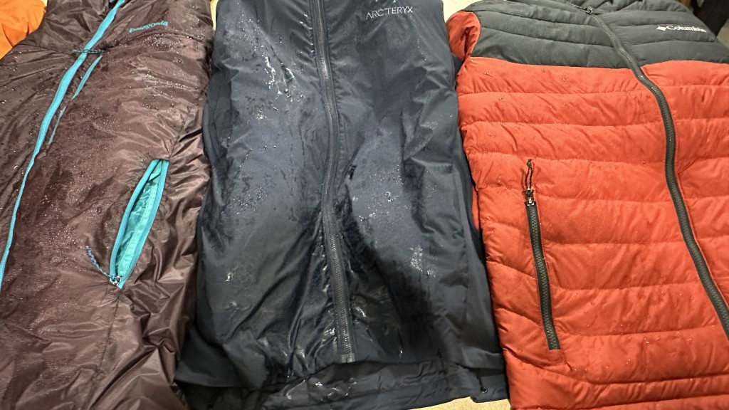 insulated jacket - some jackets repel water while other soak through to the core.