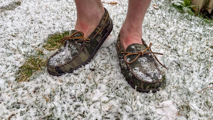 the minnetonka pile lined slippers have a hard sole that makes them...