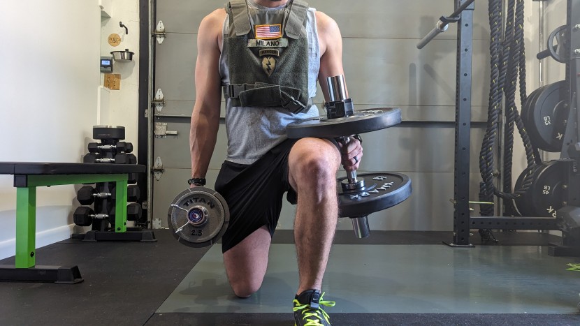 titan fitness loadable olympic handles - both dumbbells here are loaded up to 33 pounds each, using different...