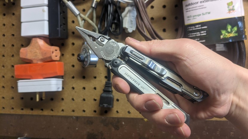 multi-tool - the leatherman arc in use.