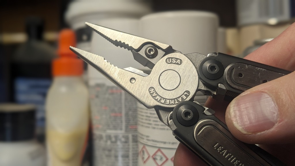 multi-tool - closeup of a replaceable wire cutter jaws. most of lm's high-end...