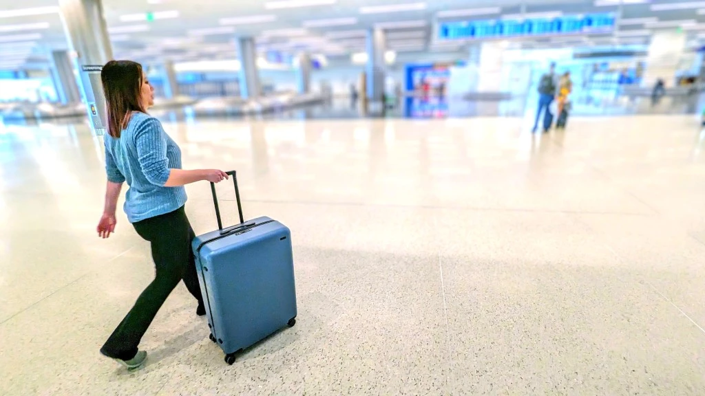luggage - moving through the airport with ease thanks to a sturdy handle and...