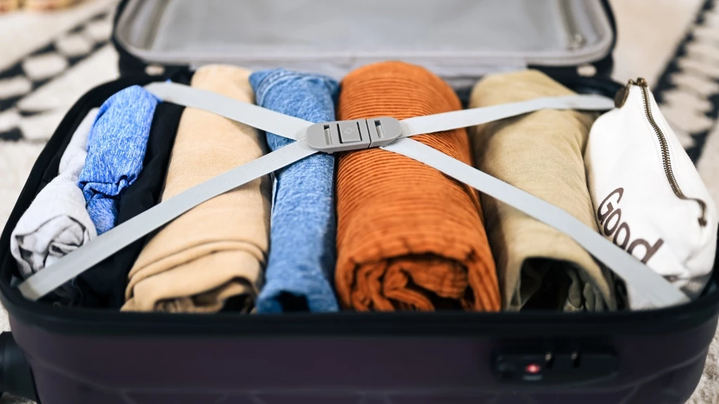 packing list - rolling your clothes and using compression straps found in many...