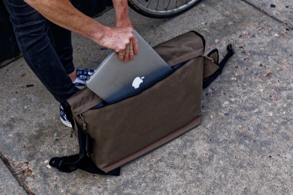 messenger bag - we like a spacious laptop pocket, and this bag features one that can...