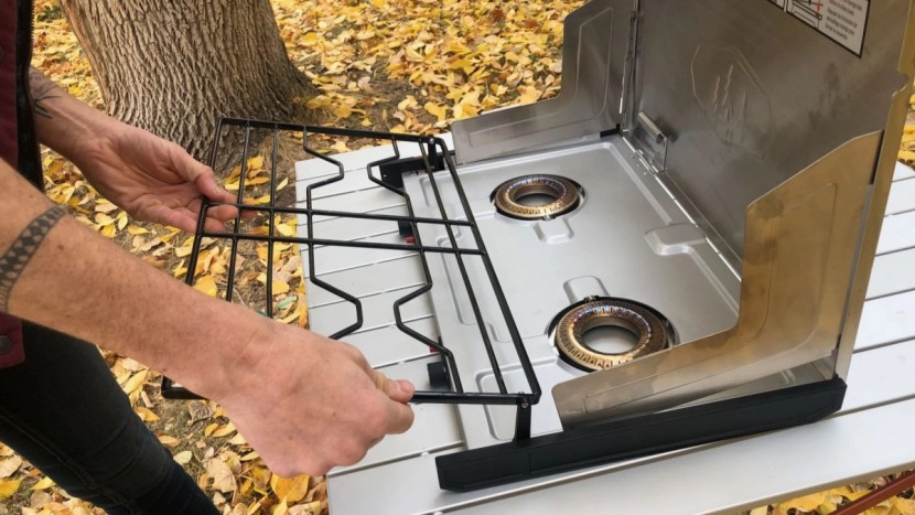camping stove - cleaning the pinnacle pro&#039;s drip pan requires unhooking the grate...