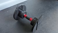 Using round dumbbells as push-up bars isn't ideal. They will easily...