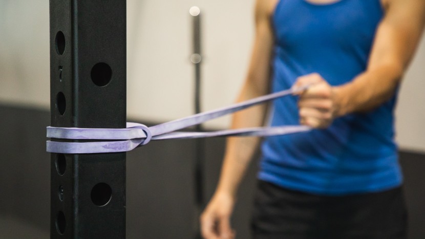 exercise resistance bands - using posts, doors, or structures to assist in band workouts is a...