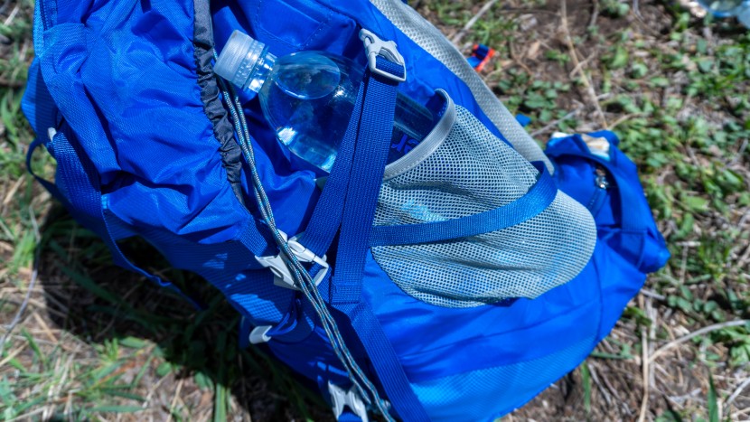 each side pocket is small, only fitting one smartwater bottle.