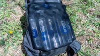 Six, one liter smartwater bottles can securely fit inside the center...
