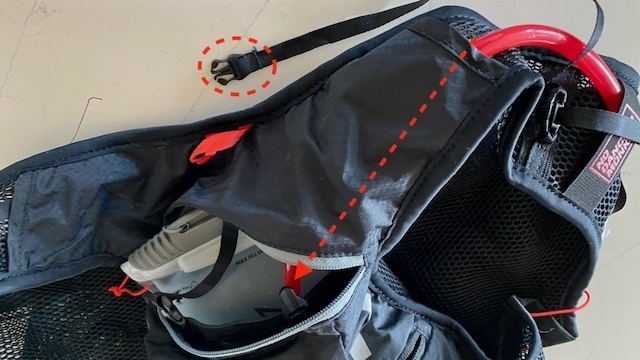 hydration pack - the arrows show how the hose routes through the pack&#039;s shoulder...
