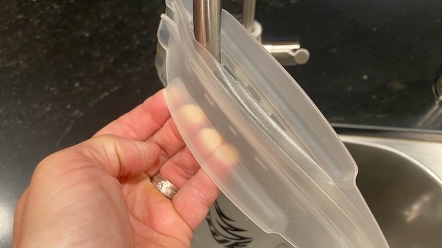 hydration pack - a small, integrated handle provides a place to hold the reservoir as...