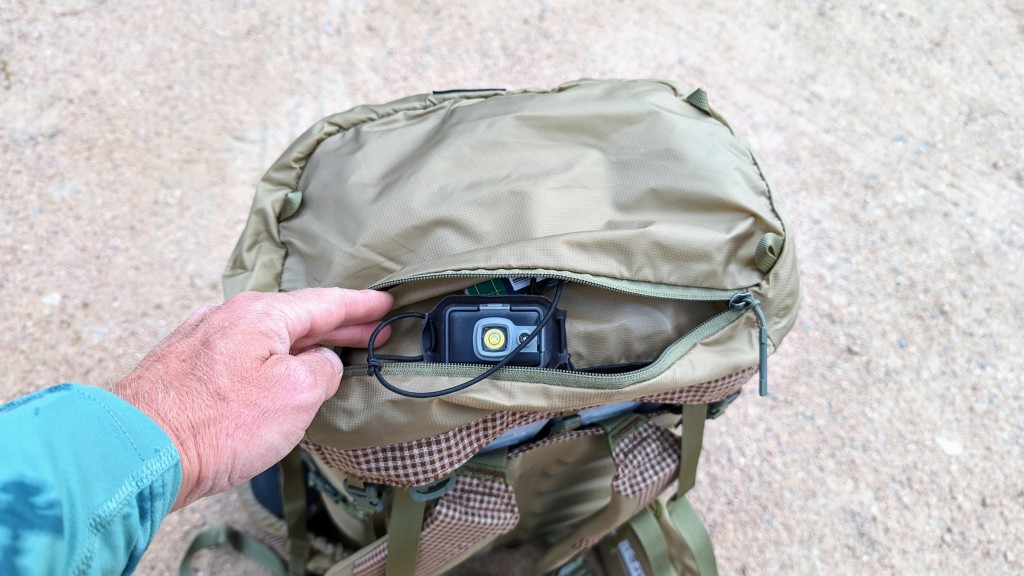 granite gear blaze 60 - the removable top lid has an exterior zipper pocket to store other...