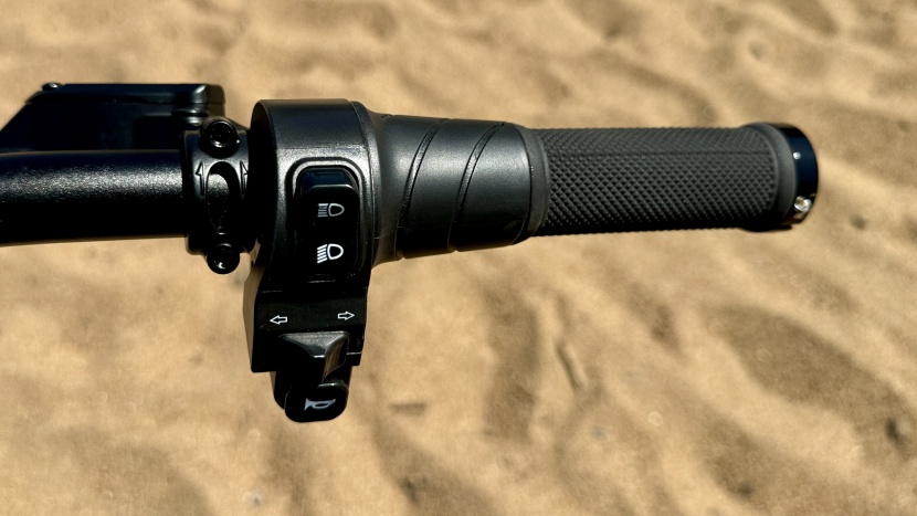 high beam, turn signals, horn.. it's more moped than a bike.