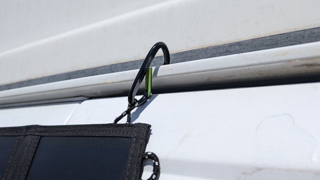 allpowers spo12 100w panel - the carabiners and cord loops sewn around its edges allow you to...