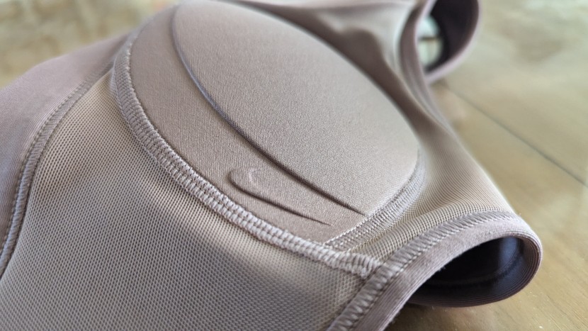 sports bra - the nike swoosh features a soft mesh lining and a sweat-wicking...