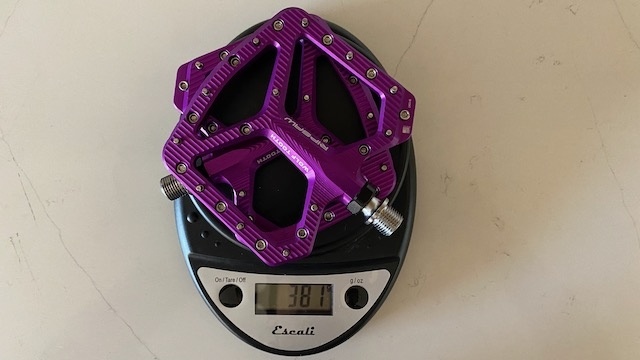 each set of pedals is measured on a kitchen scale to see what the...