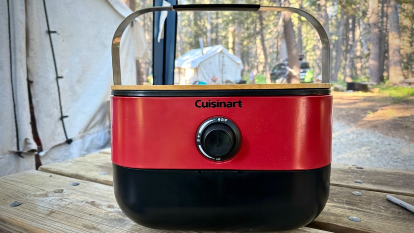 portable grill - the large handle and extra storage in the plastic section on the...