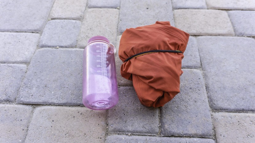 arc'teryx gamma hoody - this option is fairly light, and packs down small enough to fit in...