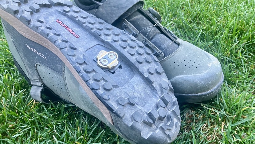 cycling shoes - mountain bike shoes feature a combination of cleats and lugs, which...