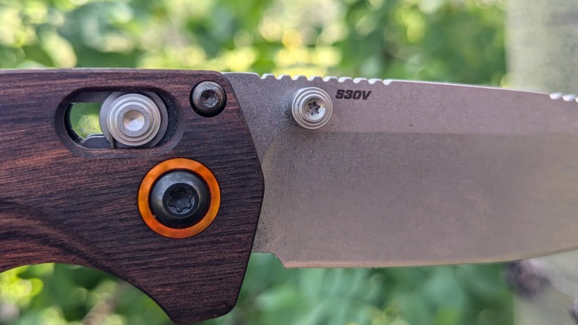 benchmade 15032 north fork - the north fork showing off it&#039;s steel alloy stamp, and orange...