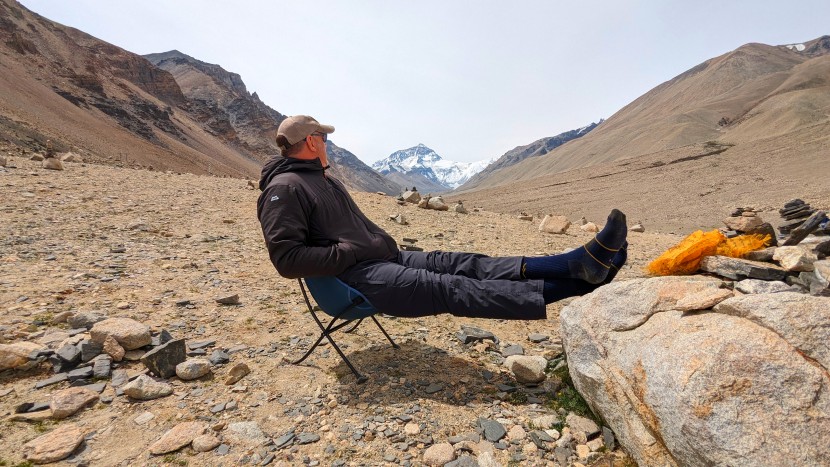 hiking socks - taking a break at 17,000 feet in tibet with snow-covered mount...