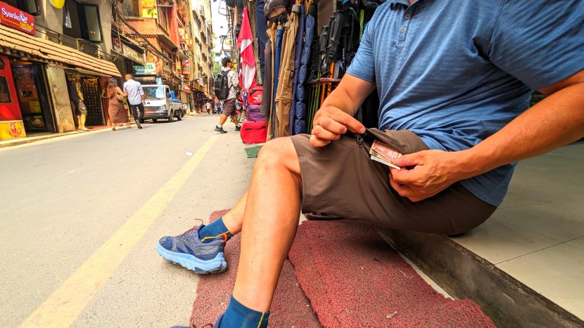 stashing some nepli rupees (dollars) in one of the renegade's two...