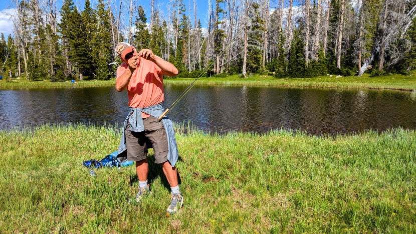 tying on a new fly while suspending our fly rod in our front pocket...