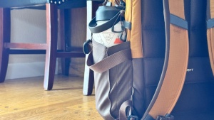 This one-liter metal water bottle handily slides into either side...