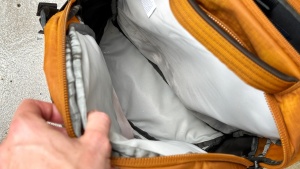 After 30 seconds of garden hose spray, water was pooled in the...