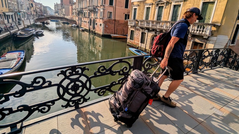 crossing over one of many canal bridges as we make our way to the...
