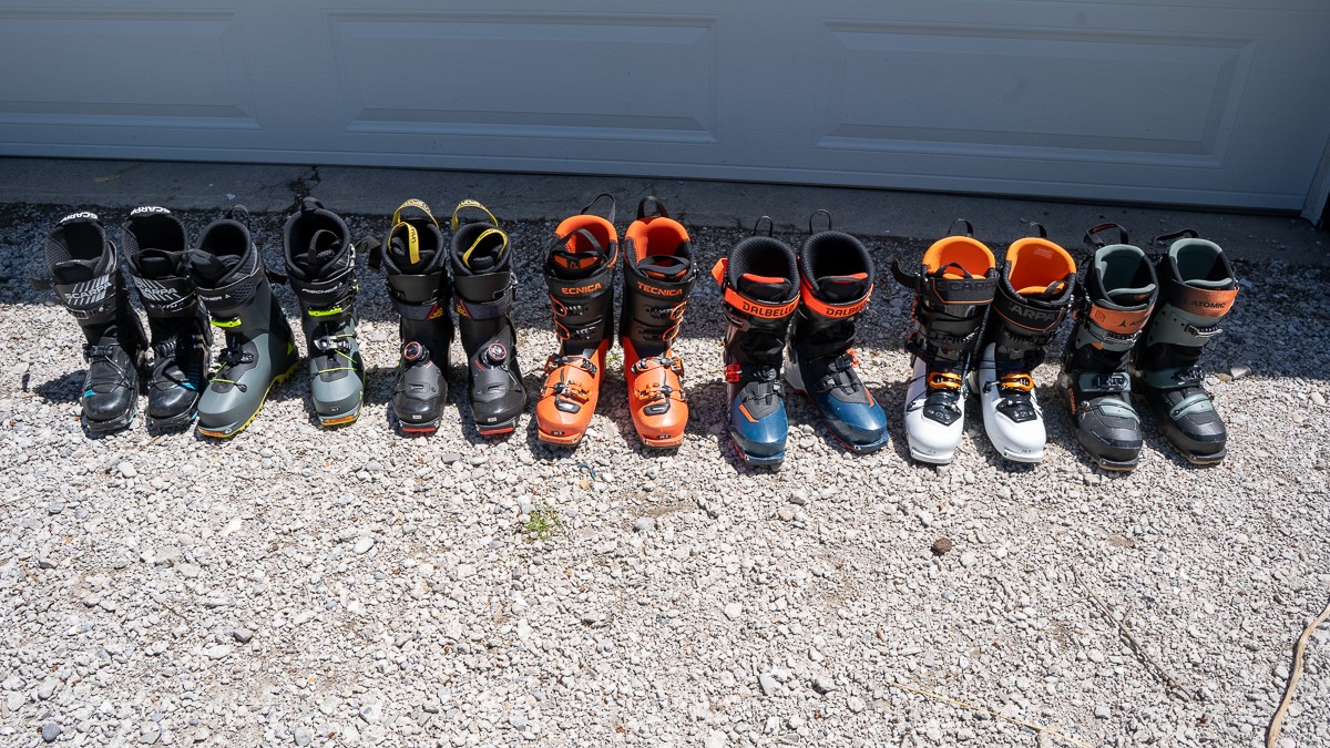 Best Backcountry Ski Boots Review (2024 selection of newly tested backcountry ski boots. Left to right: F1 XT, Fischer Transalp, Sportiva Skorpius...)