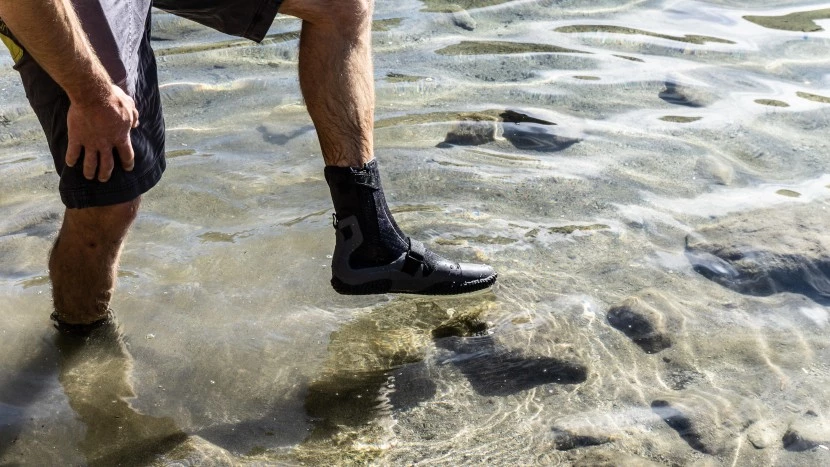 Neoprene booties providing excellent insulation and comfort for long days in chilly water