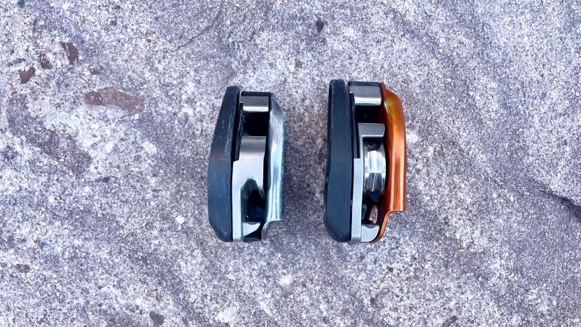 the petzl grigri (left) is smaller and lighter than the petzl neox...