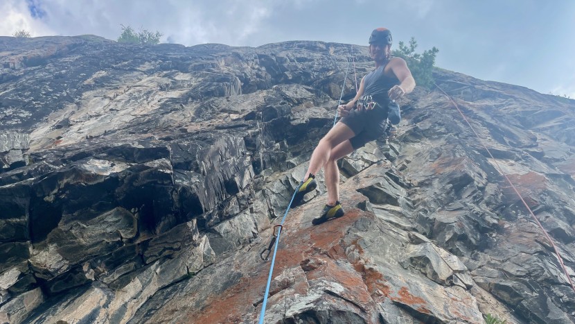 lowering off a sport climb with an active abd.