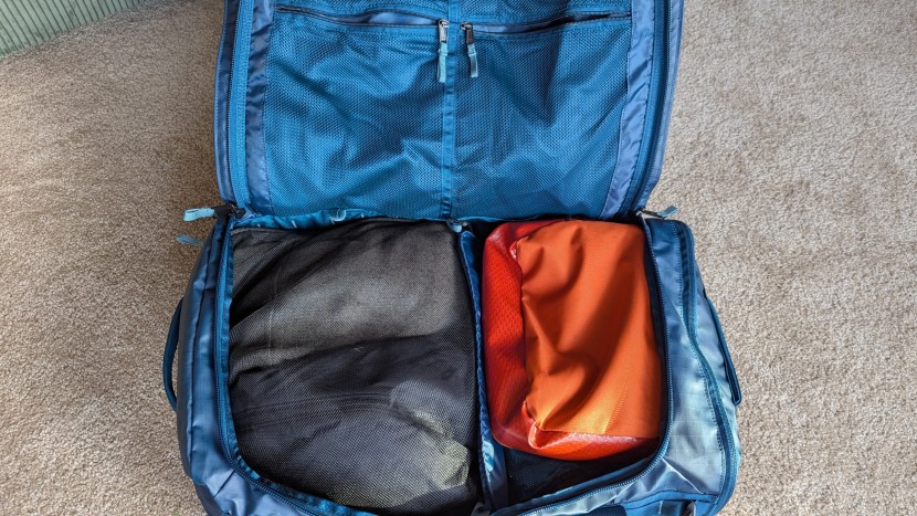 the north face base camp voyager duffel - the removable divider can split up the main compartment of the...