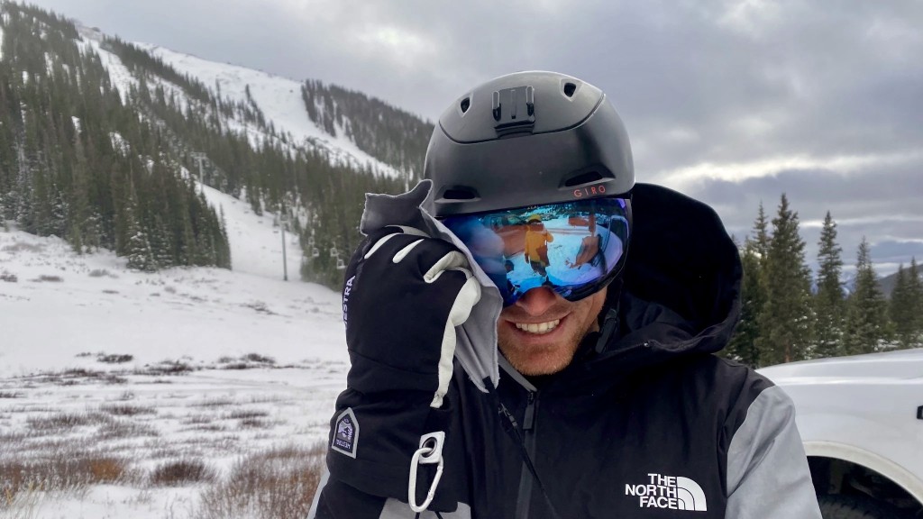 ski jacket men - a goggle wipe on an elastic tether is attached to the inside of the...