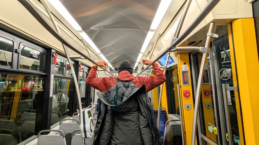 the straps slide seamlessly onto the shoulders when you put the coat...