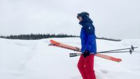 Hiking to the slopes on a sub-zero day while testing ski pants.