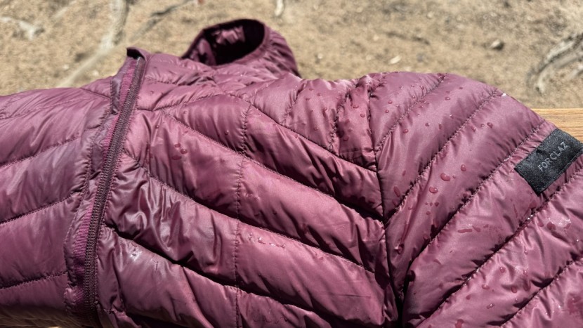 decathlon forclaz mt100 hooded puffer for women - the polyamide shell resisted water during our lab tests, though some...