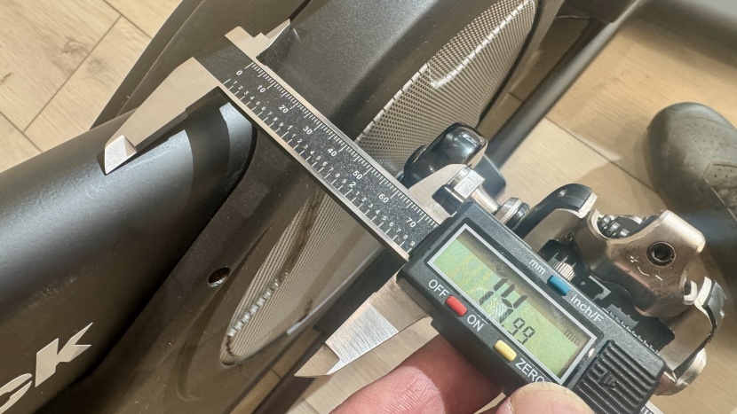 from the base of the pedal spindle to the bike's midline, measured...