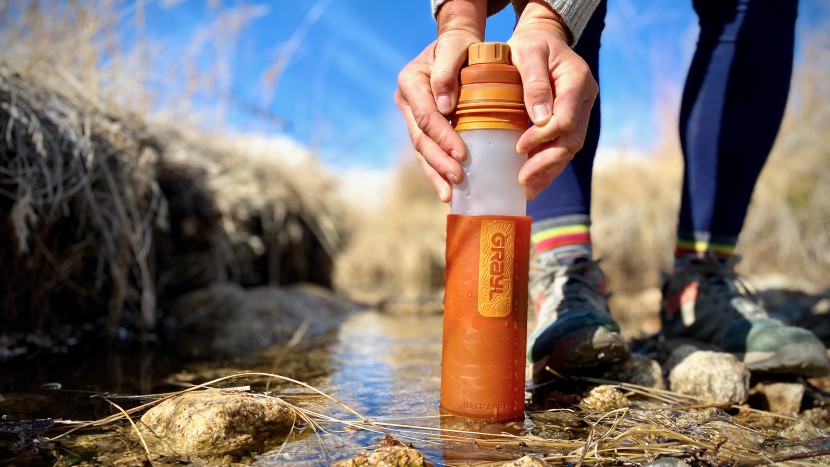 backpacking water filter - water is pressed through the filter to remove bacteria, protozoa...