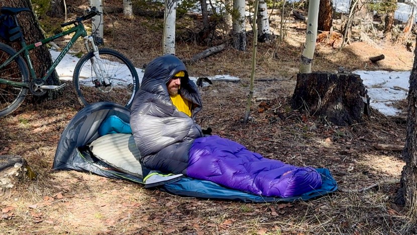 an early season bikepacking trip is enhanced with a warm sleeping...