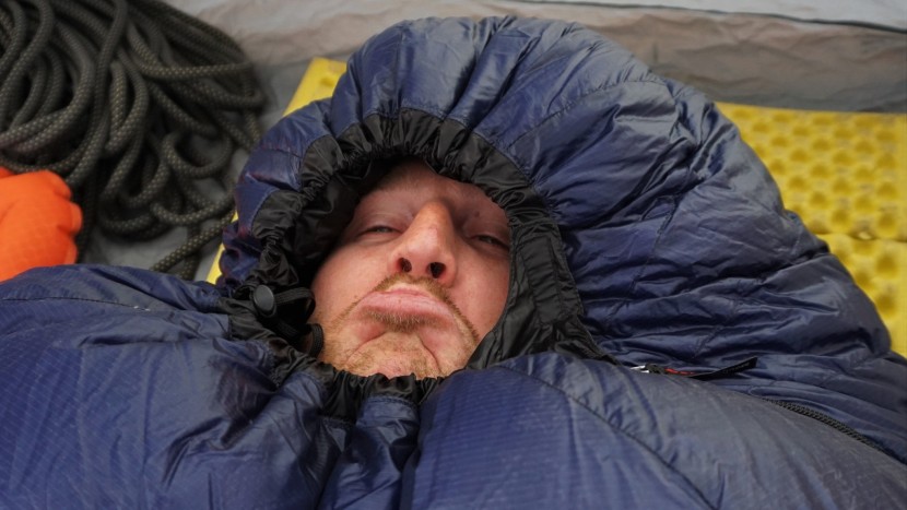 backpacking sleeping bag - one of our testers exaggerates his discomfort with the western...