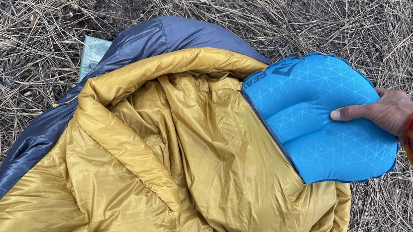 this pillow pocket is our favorite feature on this bag.