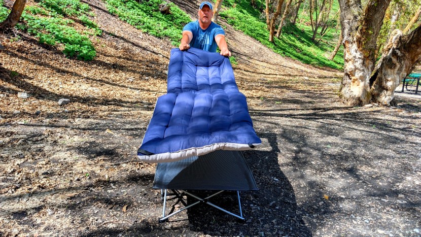 camping cot - deploying the optional mattress of the aboron folding with mat.