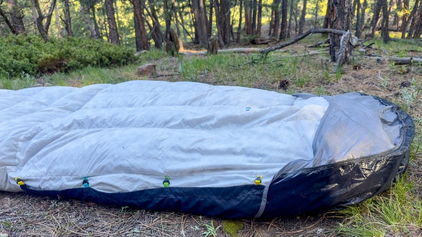 to afix the bed to the quilt, a series of small, color-coordinated...