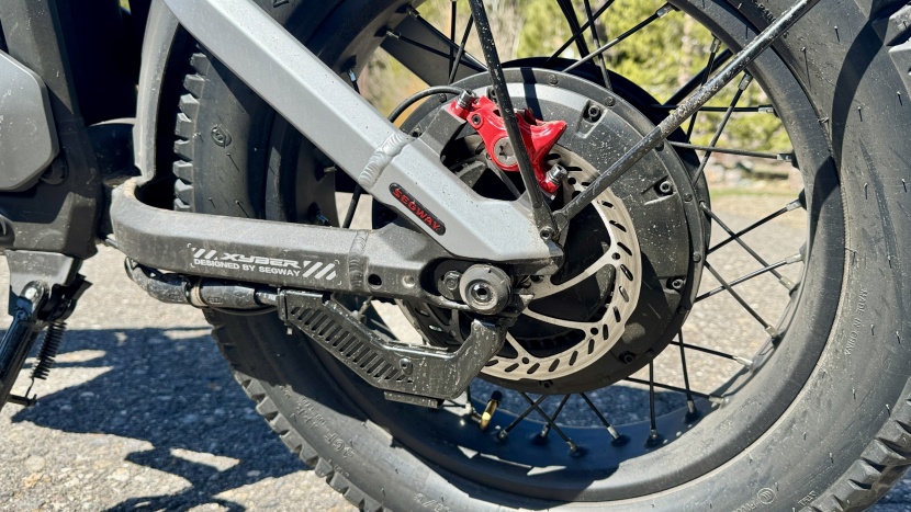 the rear brake uses a 2-piston caliper and a 180mm rotor that...
