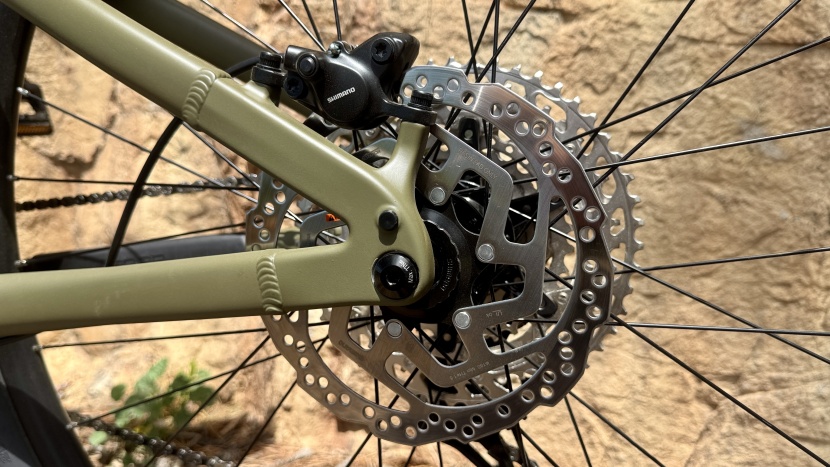 a thru-axle rear end provides a solid connection with the rear...