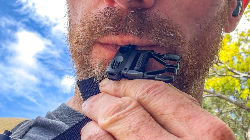 the tiny whistle integrated into the sternum strap of the pa'lante...