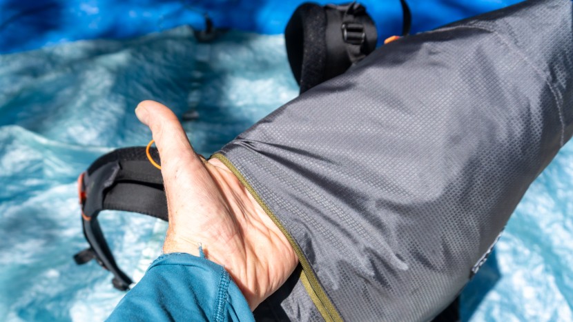 the top flap has a small zippered pocket to conveniently put items...